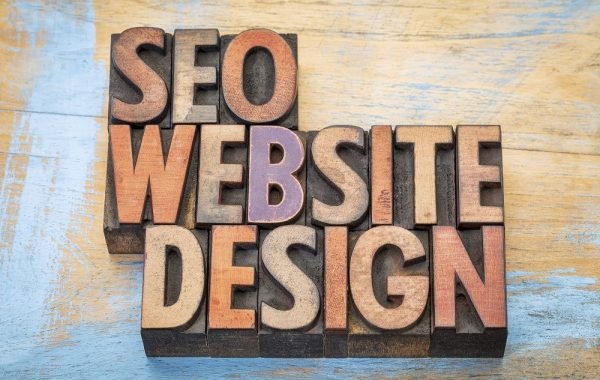 seo and website design word abstract in wood type seo and website design word abstract in wood type